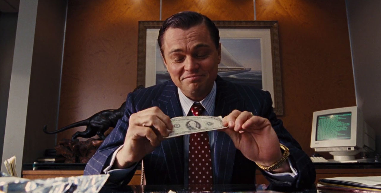 Leonardo Dicaprio felizão com seu dinheiro